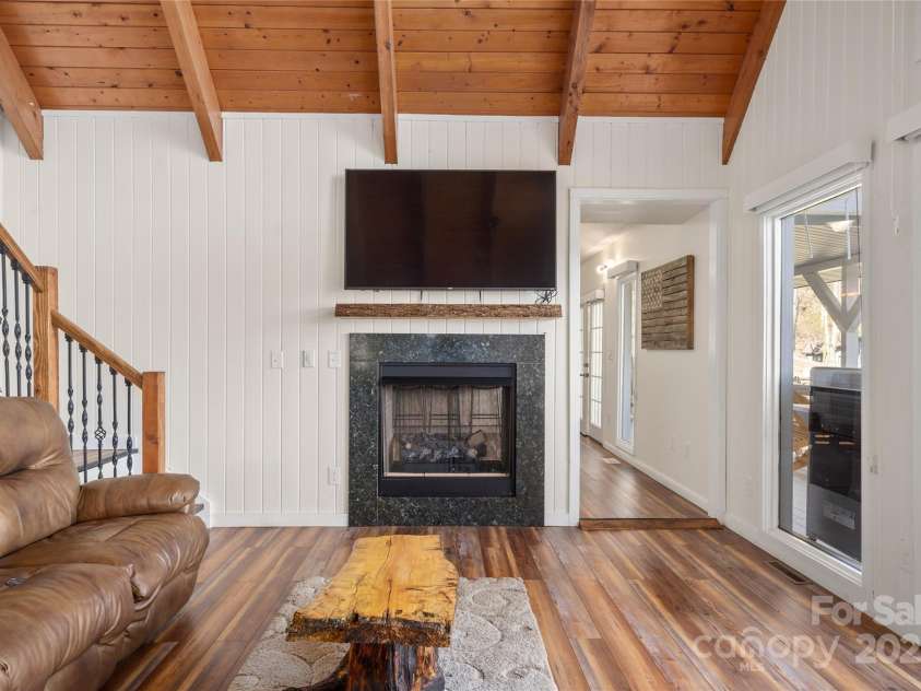 158 Blackberry Lane, Maggie Valley, NC 28751.  MLS# CAR4242897, YatesRealty ID 138. Gas Fireplace in Living Room