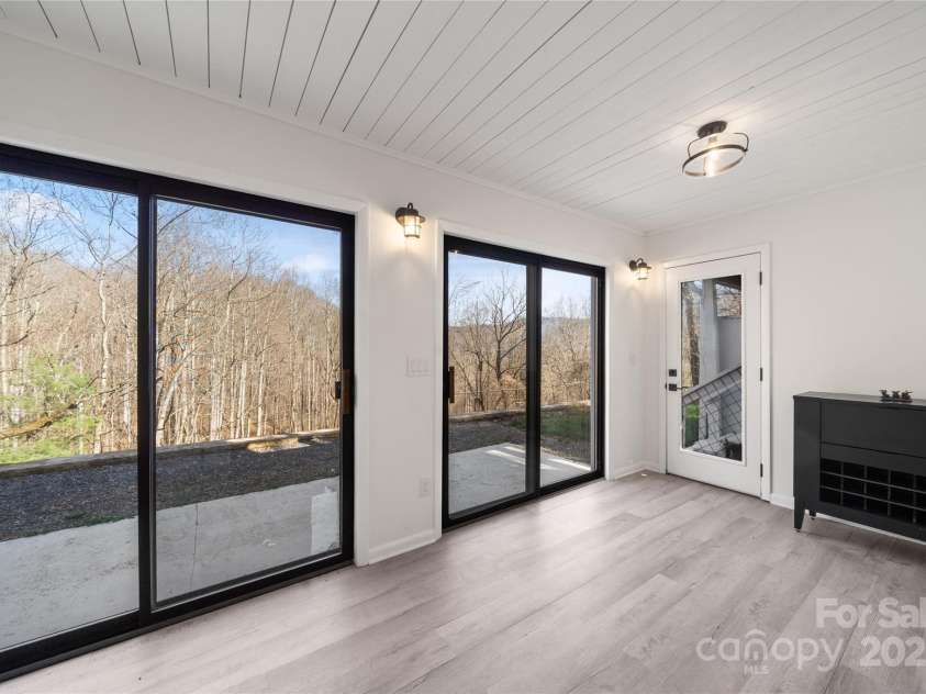 158 Blackberry Lane, Maggie Valley, NC 28751.  MLS# CAR4242897, YatesRealty ID 138. Lower Level Closed In Porch - Another View