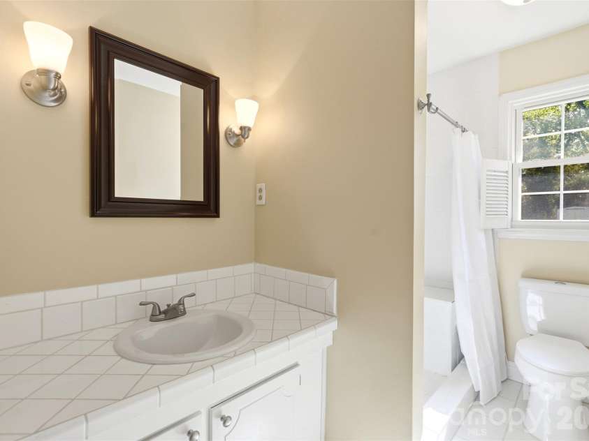 1406 Lakeview Drive, Monroe, NC 28112.  MLS# CAR4358225, YatesRealty ID 13800. Hall Bathroom