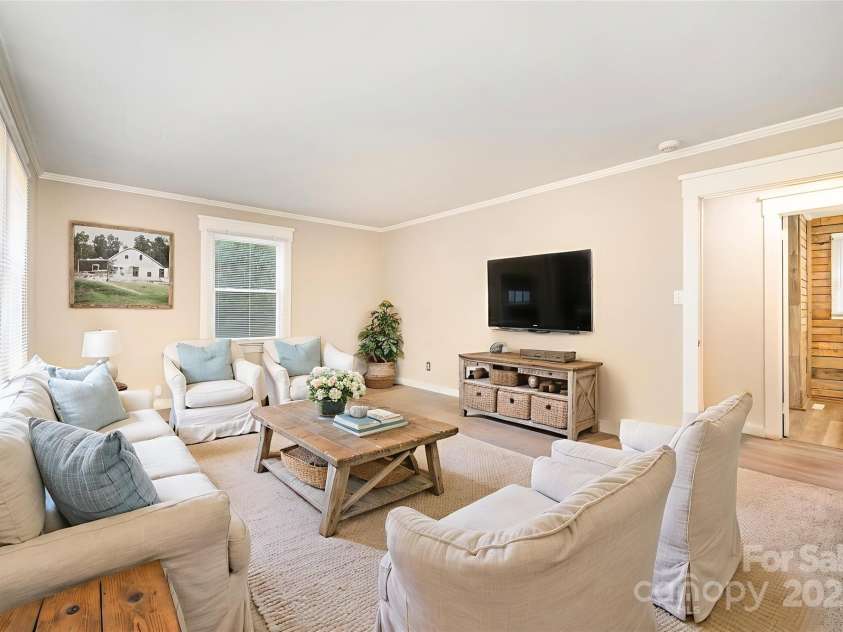 1201 Berkshire Drive, Kannapolis, NC 28081.  MLS# CAR4312333, YatesRealty ID 13802. Formal front facing living room *Virtually Staged*