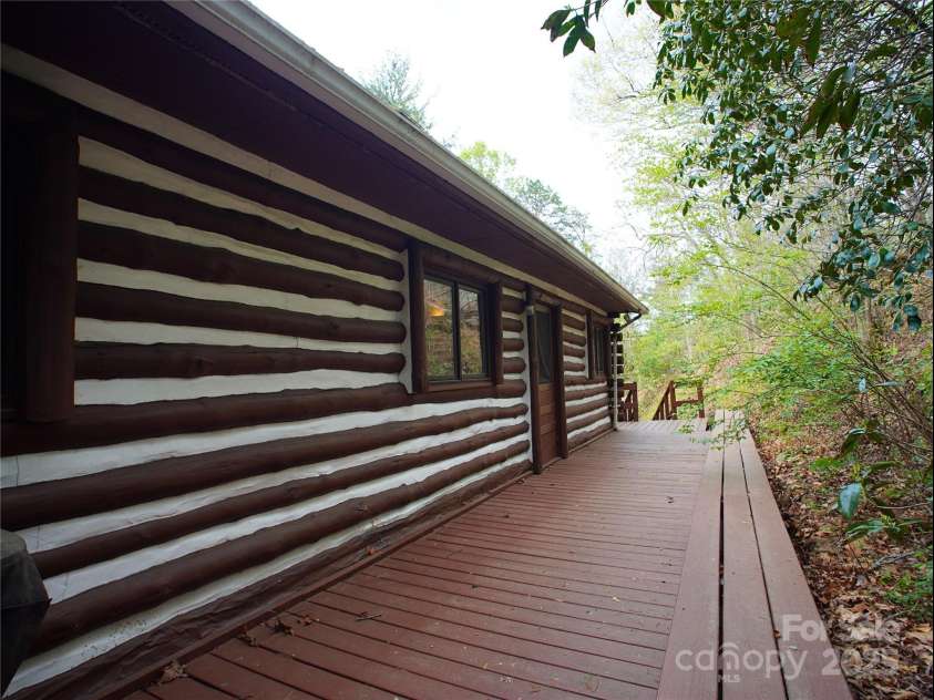 28 Fore Road, Asheville, NC 28806.  MLS# CAR4206820, YatesRealty ID 13803. Back porch (exit to parking at the end)