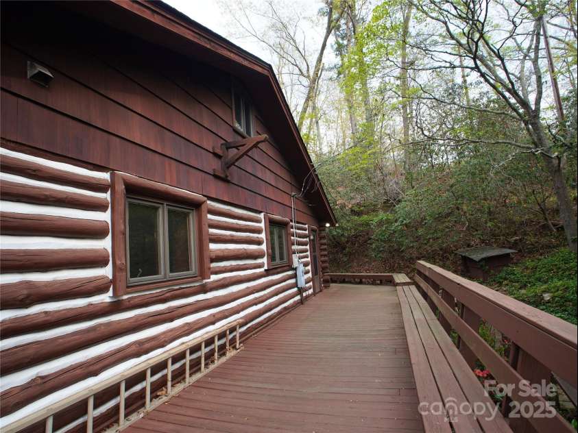 28 Fore Road, Asheville, NC 28806.  MLS# CAR4206820, YatesRealty ID 13803. Porch with stairs on the right to go down