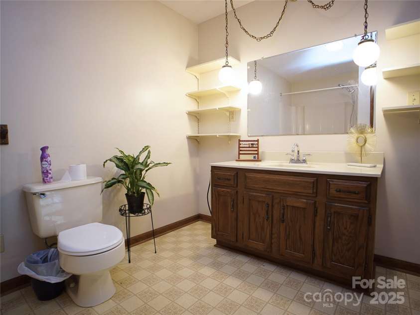 28 Fore Road, Asheville, NC 28806.  MLS# CAR4206820, YatesRealty ID 13803. Primary bath