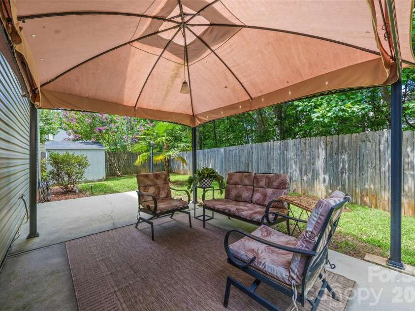 746 Ladino Lane, Clover, SC 29710.  MLS# CAR4403509, YatesRealty ID 13807. Back Patio