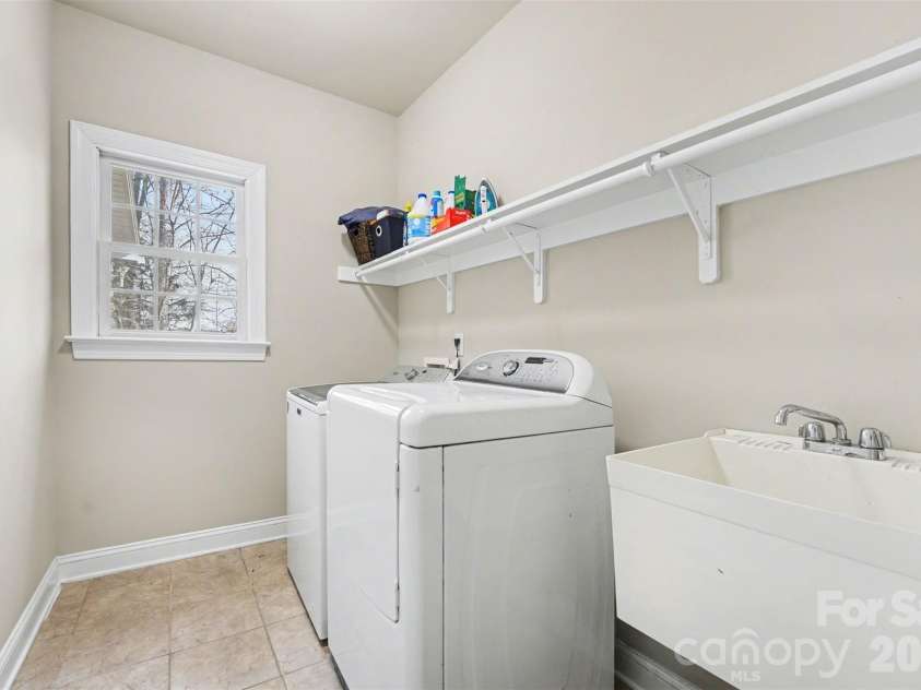 4111 Harmattan Drive, Denver, NC 28037.  MLS# CAR4358146, YatesRealty ID 13808. Ample sized main level laundry room.