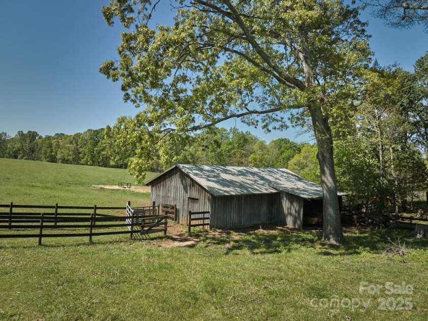 820 Phillips Road, Columbus, NC 28722.  MLS# CAR4250822, YatesRealty ID 13808. Livestock or equipment barn