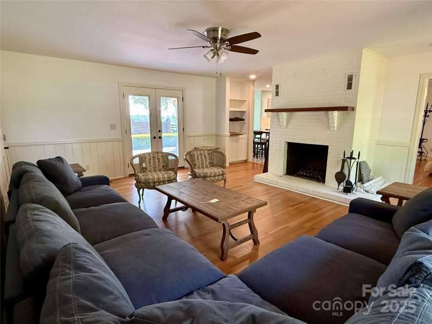 820 Phillips Road, Columbus, NC 28722.  MLS# CAR4250822, YatesRealty ID 13808. Living room with fireplace