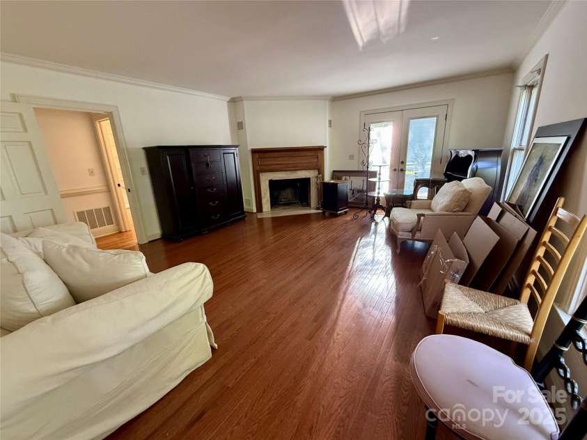 820 Phillips Road, Columbus, NC 28722.  MLS# CAR4250822, YatesRealty ID 13808. Living room with fireplace