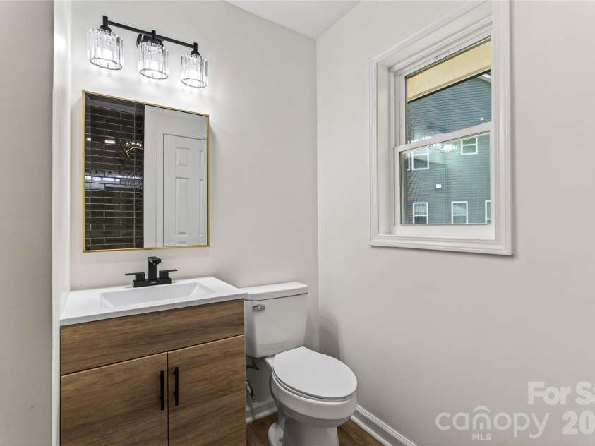 4844 Hidden Valley Road, Charlotte, NC 28213.  MLS# CAR4370893, YatesRealty ID 13810. Guest bathroom