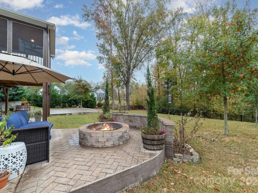 4660 Ardmore Lane, Harrisburg, NC 28075.  MLS# CAR4232846, YatesRealty ID 13811. Back side yard