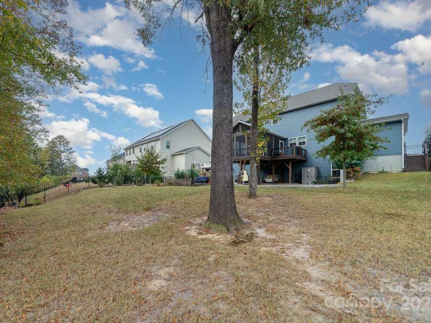 4660 Ardmore Lane, Harrisburg, NC 28075.  MLS# CAR4232846, YatesRealty ID 13811. Back yard