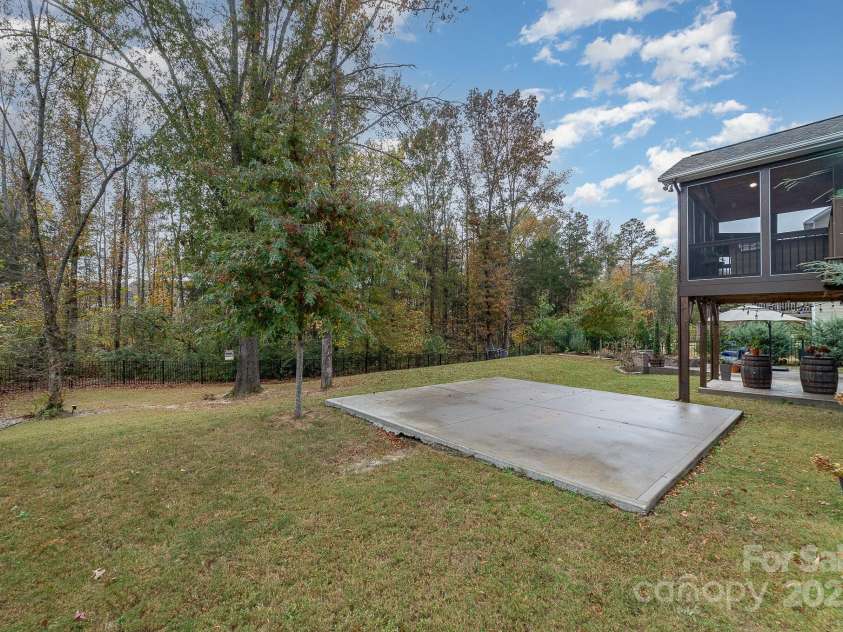 4660 Ardmore Lane, Harrisburg, NC 28075.  MLS# CAR4232846, YatesRealty ID 13811. Back yard