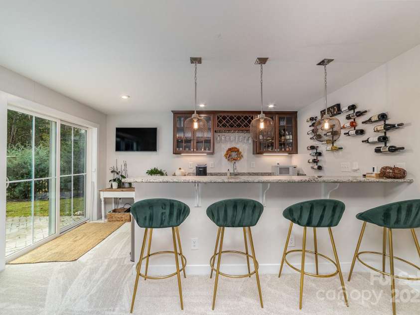 4660 Ardmore Lane, Harrisburg, NC 28075.  MLS# CAR4232846, YatesRealty ID 13811. Basement bar