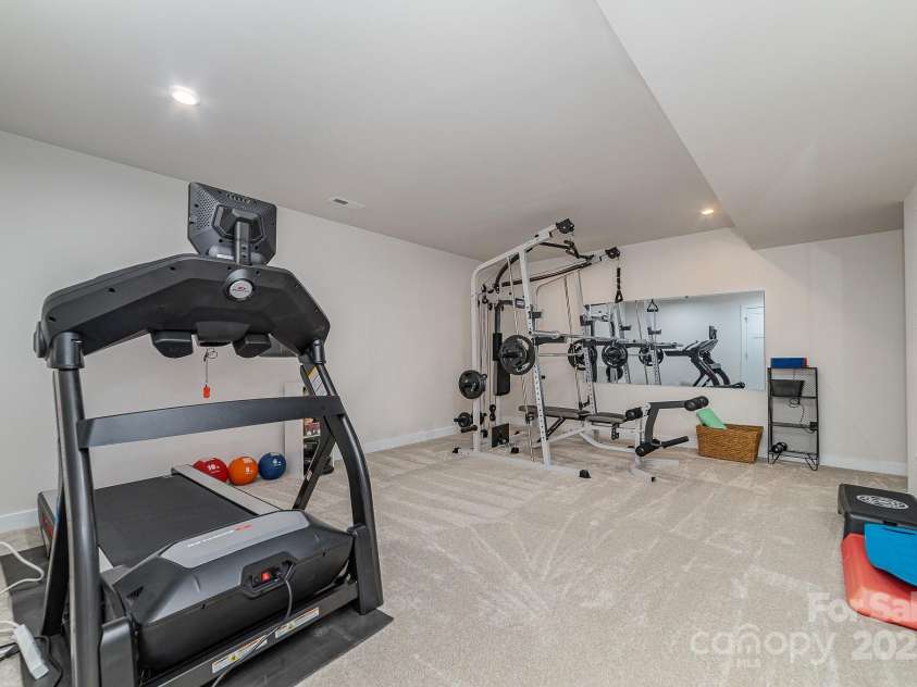 4660 Ardmore Lane, Harrisburg, NC 28075.  MLS# CAR4232846, YatesRealty ID 13811. Basement flex space/work out room