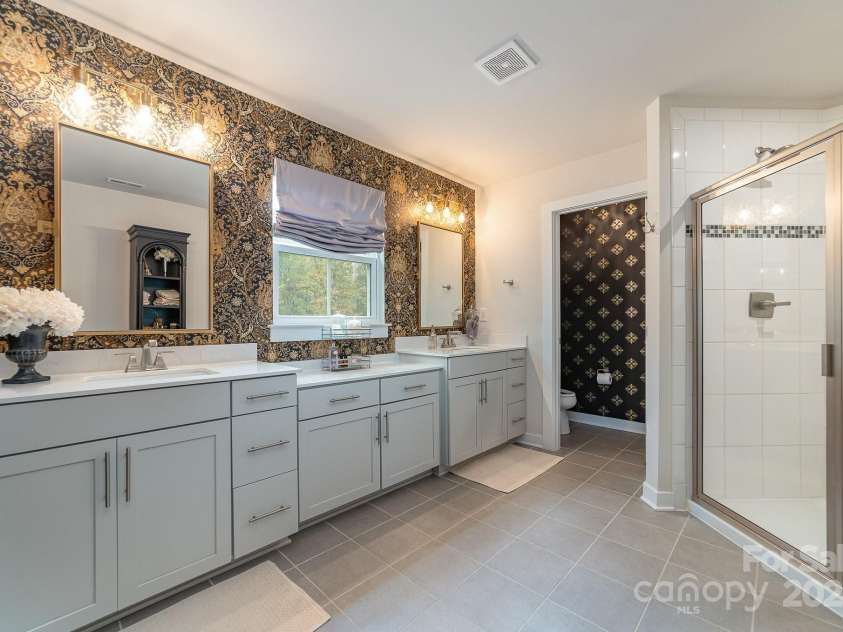 4660 Ardmore Lane, Harrisburg, NC 28075.  MLS# CAR4232846, YatesRealty ID 13811. Primary bath