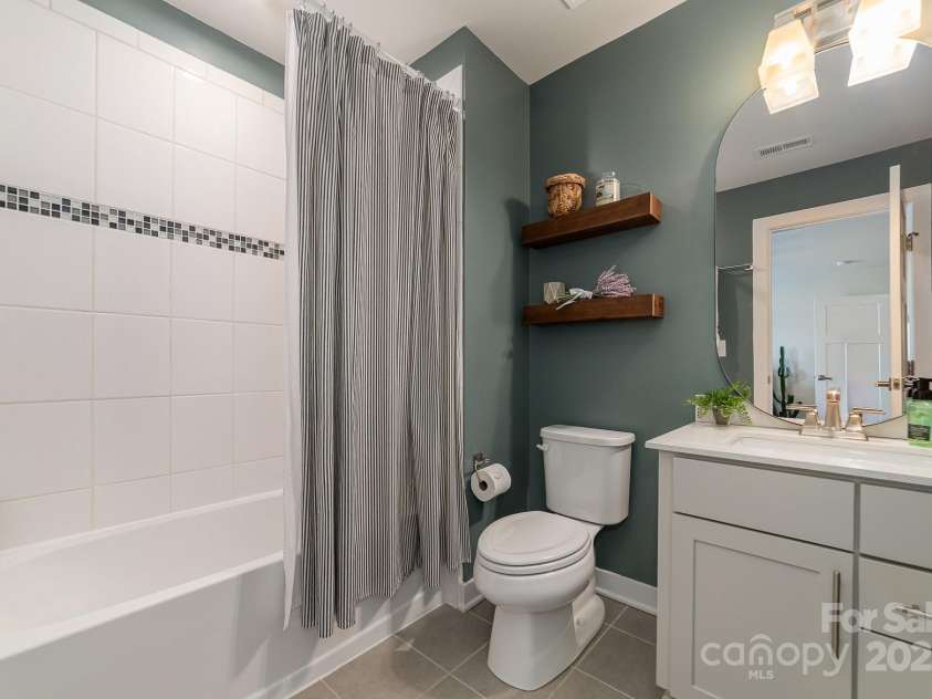 4660 Ardmore Lane, Harrisburg, NC 28075.  MLS# CAR4232846, YatesRealty ID 13811. Secondary bedroom ensuite bath