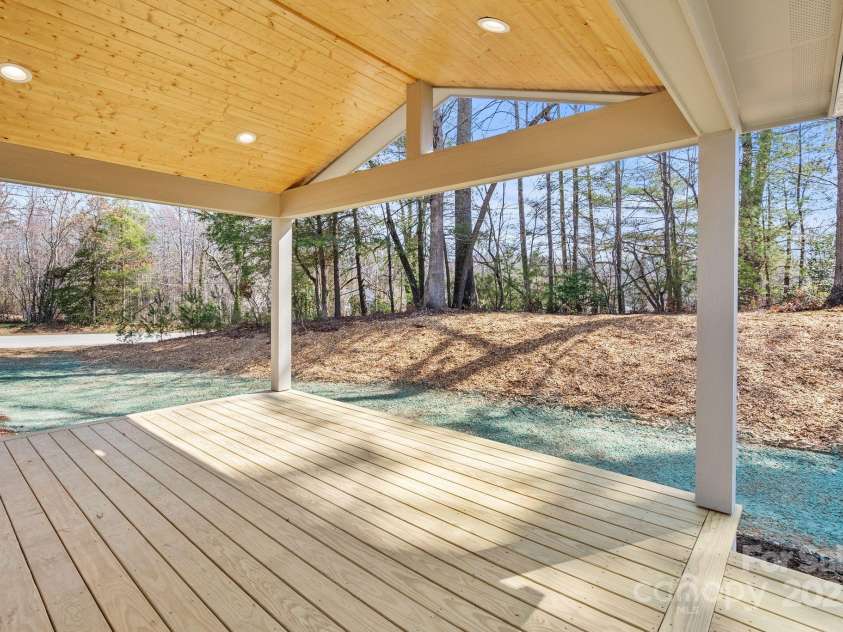 1416 Howard Gap Loop Road, Flat Rock, NC 28731.  MLS# CAR4234624, YatesRealty ID 13813. Back Porch
