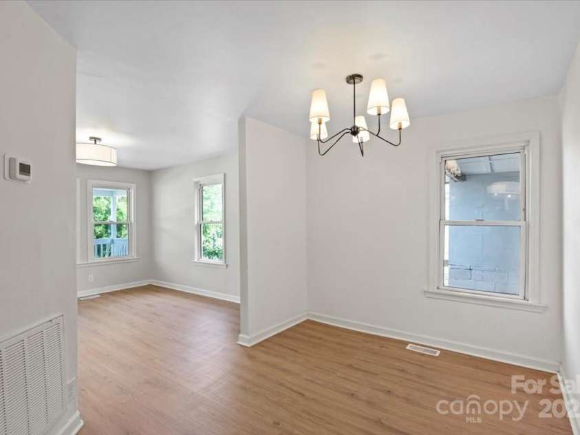 300 Ervin Avenue, Newton, NC 28658.  MLS# CAR4247888, YatesRealty ID 13814. Dining area