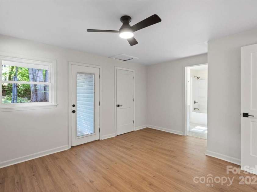 300 Ervin Avenue, Newton, NC 28658.  MLS# CAR4247888, YatesRealty ID 13814. Master bedroom