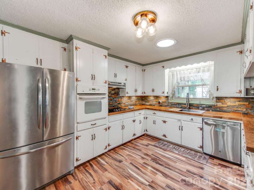 235 Central Heights Drive, Concord, NC 28025.  MLS# CAR4367935, YatesRealty ID 13815. 