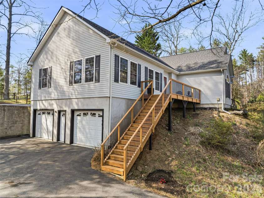 150 White Pine Drive, Fletcher, NC 28732.  MLS# CAR4365565, YatesRealty ID 13816. Recently remodeled front deck - exquisitely done!