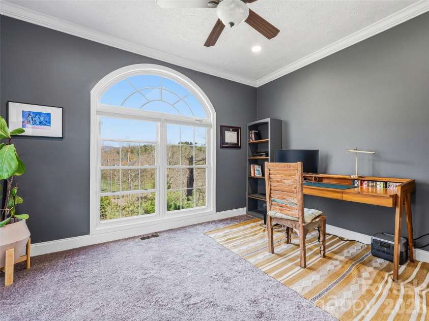 150 White Pine Drive, Fletcher, NC 28732.  MLS# CAR4365565, YatesRealty ID 13816. Third bedroom with floor to ceiling window currently used as an office.