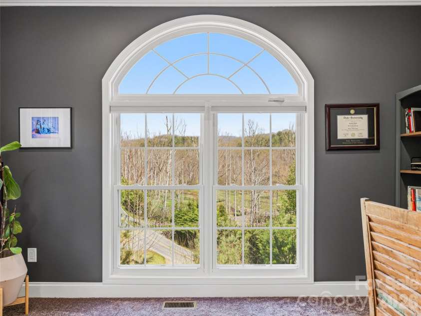 150 White Pine Drive, Fletcher, NC 28732.  MLS# CAR4365565, YatesRealty ID 13816. Third bedroom with floor to ceiling window currently used as an office.