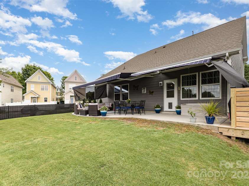 126 Morehouse Avenue, Mooresville, NC 28117.  MLS# CAR4271679, YatesRealty ID 13821. Backyard