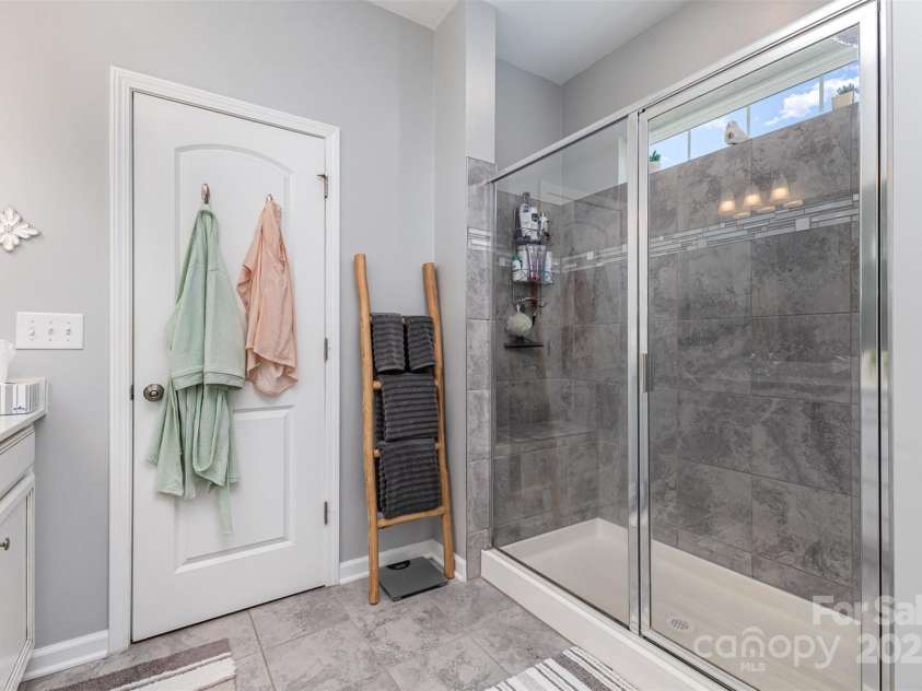 126 Morehouse Avenue, Mooresville, NC 28117.  MLS# CAR4271679, YatesRealty ID 13821. Main Level Primary Bathroom