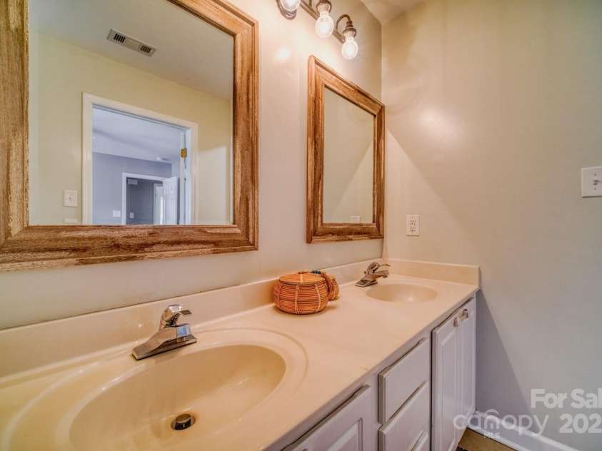 7122 Marlin Street, Gastonia, NC 28056.  MLS# CAR4257729, YatesRealty ID 13826. Ensuite bath with dual sink vanity