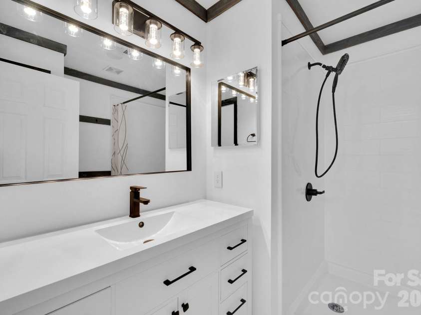 18755 Vineyard Point Lane, Cornelius, NC 28031.  MLS# CAR4371639, YatesRealty ID 13827. Primary Bath with New Vanity
