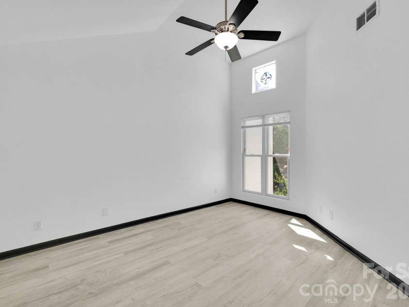 18755 Vineyard Point Lane, Cornelius, NC 28031.  MLS# CAR4371639, YatesRealty ID 13827. Primary Bedroom with Vaulted Ceiling