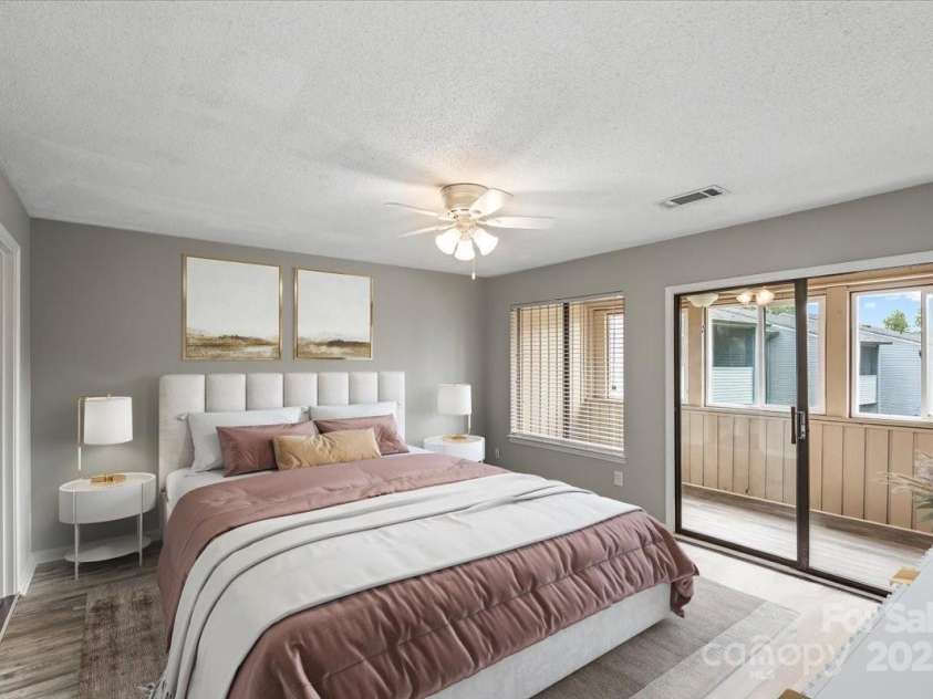 6610 Point Comfort Lane, Charlotte, NC 28226.  MLS# CAR4298567, YatesRealty ID 1383. Primary Bedroom with Private Sunroom attached (Virtually Staged)