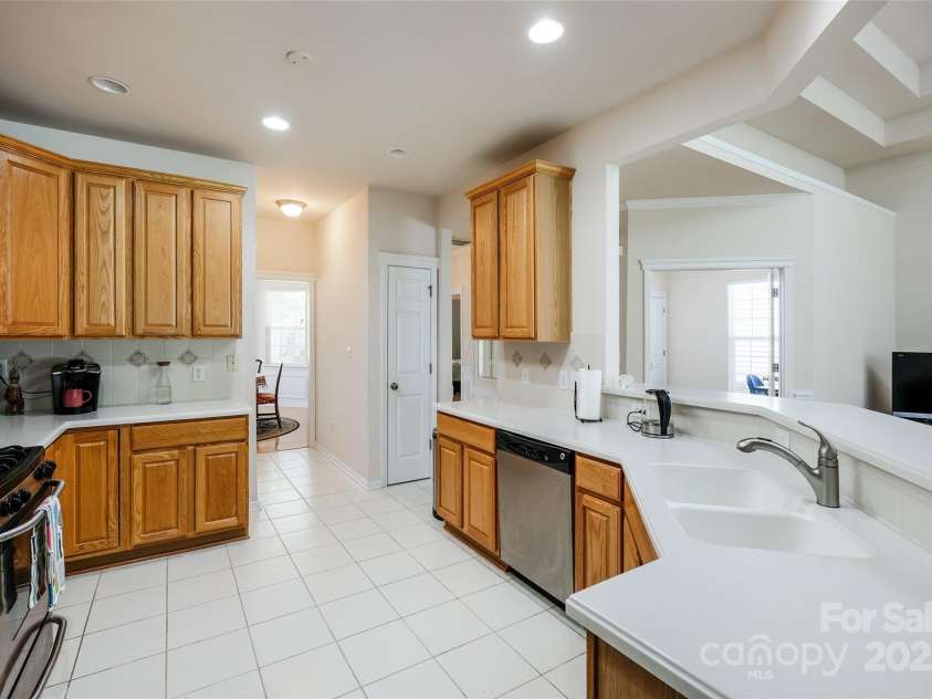 1027 Feather Oak Lane, Matthews, NC 28104.  MLS# CAR4251945, YatesRealty ID 13830. 