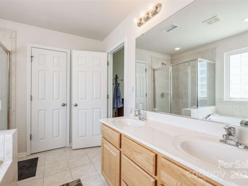 1027 Feather Oak Lane, Matthews, NC 28104.  MLS# CAR4251945, YatesRealty ID 13830. 