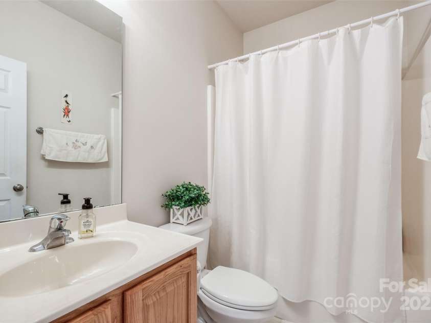 1027 Feather Oak Lane, Matthews, NC 28104.  MLS# CAR4251945, YatesRealty ID 13830. 