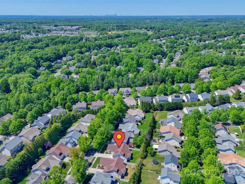 1027 Feather Oak Lane, Matthews, NC 28104.  MLS# CAR4251945, YatesRealty ID 13830. 