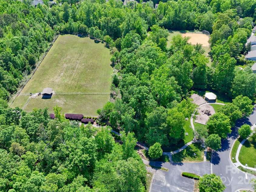 1027 Feather Oak Lane, Matthews, NC 28104.  MLS# CAR4251945, YatesRealty ID 13830. 