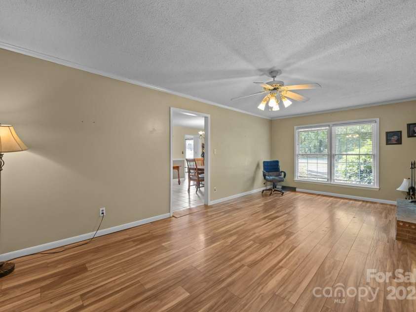 1818 Winfield Drive, Monroe, NC 28110.  MLS# CAR4258532, YatesRealty ID 13831. Family room