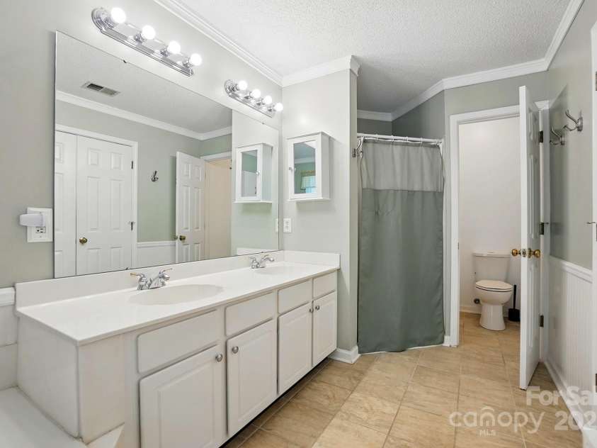 8744 Barrister Way, Charlotte, NC 28216.  MLS# CAR4258006, YatesRealty ID 13832. Owner's Bathroom
