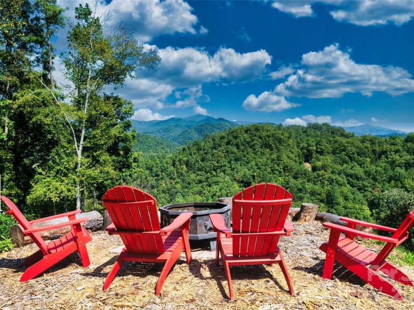 55 Laurel Ridge, Marshall, NC 28753.  MLS# CAR4353005, YatesRealty ID 13833. Firepit between the structures provides a spectacular respite.