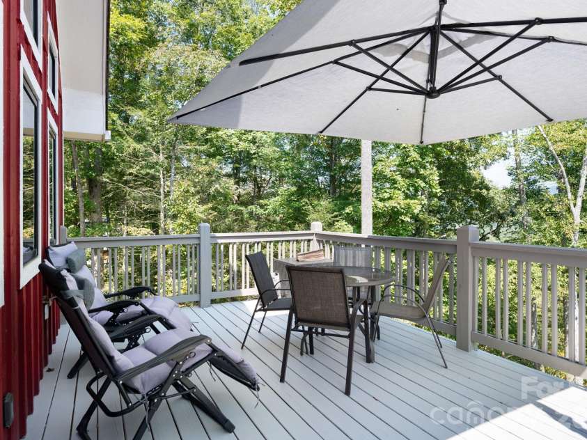 55 Laurel Ridge, Marshall, NC 28753.  MLS# CAR4353005, YatesRealty ID 13833. Large Deck with matching long-range view.