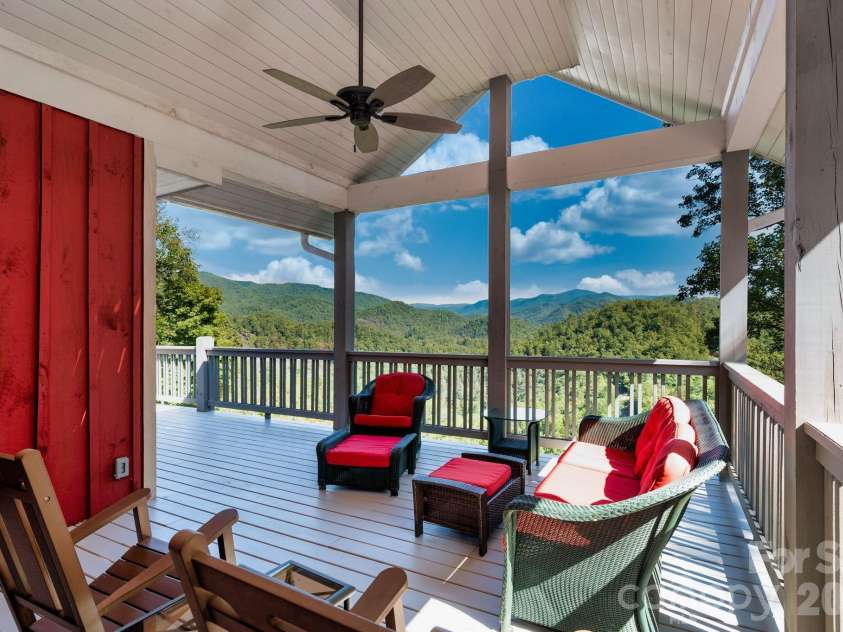 55 Laurel Ridge, Marshall, NC 28753.  MLS# CAR4353005, YatesRealty ID 13833. Main house upper level covered deck sitting area