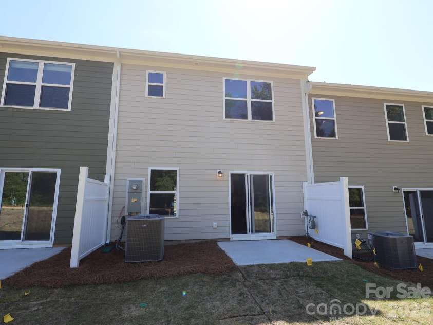3135 Lilac Grove Drive, Charlotte, NC 28269.  MLS# CAR4370629, YatesRealty ID 13846. Rear exterior