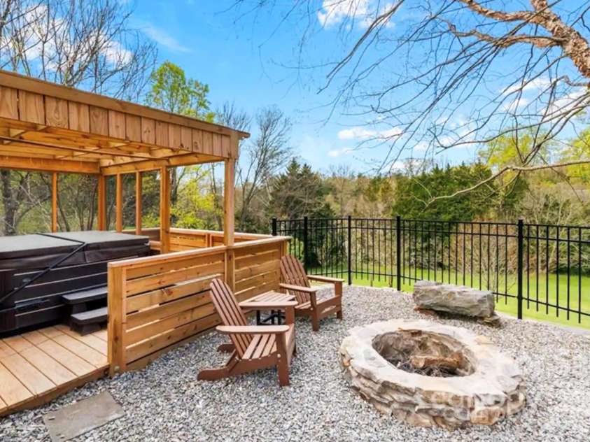 1236 Upper Brush Creek Road, Fairview, NC 28730.  MLS# CAR4233787, YatesRealty ID 13847. Cottage hot tub & gazebo