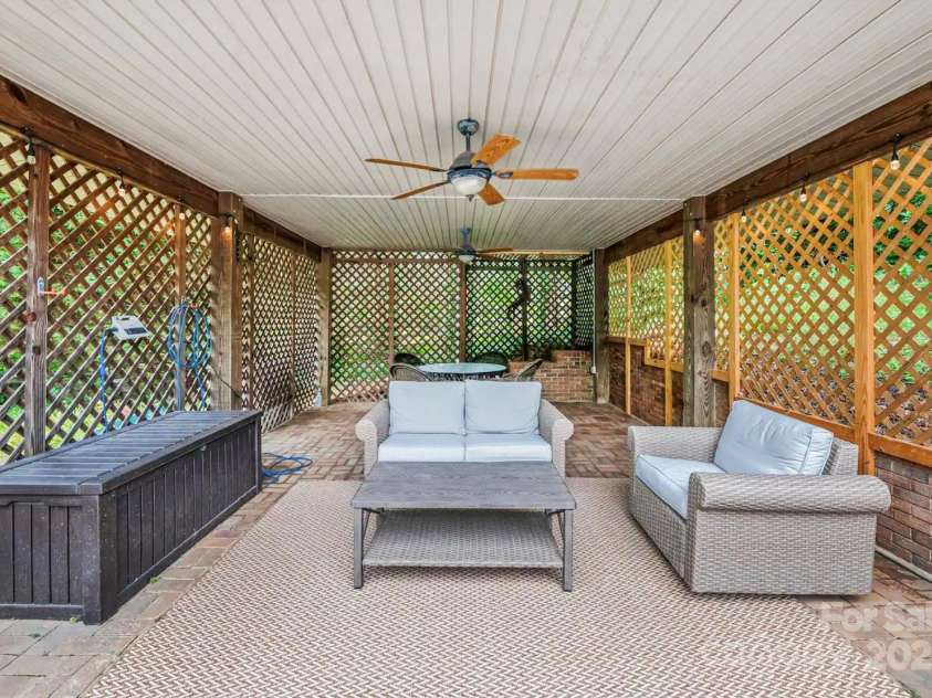 1236 Upper Brush Creek Road, Fairview, NC 28730.  MLS# CAR4233787, YatesRealty ID 13847. Covered pool lounge