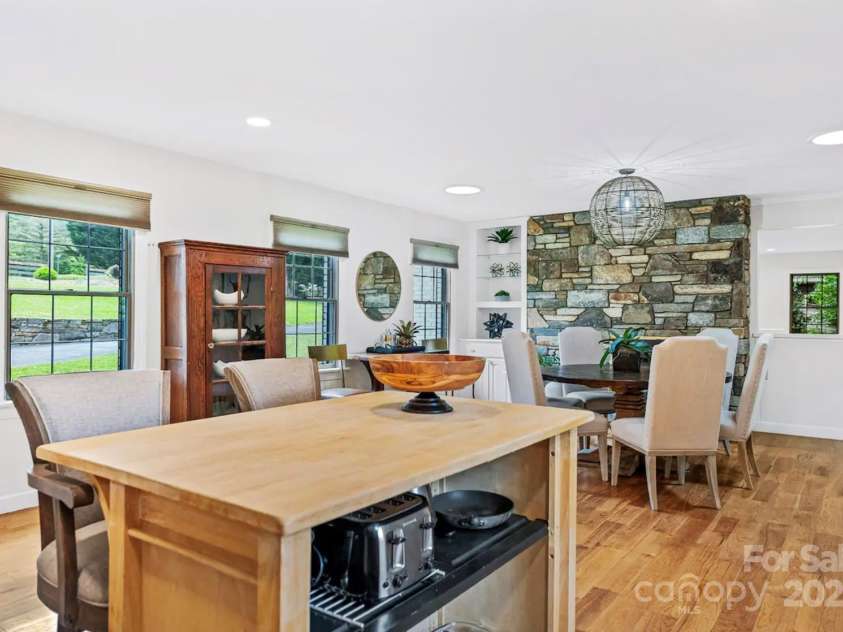 1236 Upper Brush Creek Road, Fairview, NC 28730.  MLS# CAR4233787, YatesRealty ID 13847. Dining view from kitchen