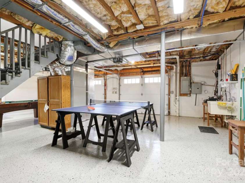 1236 Upper Brush Creek Road, Fairview, NC 28730.  MLS# CAR4233787, YatesRealty ID 13847. Flex space in basement