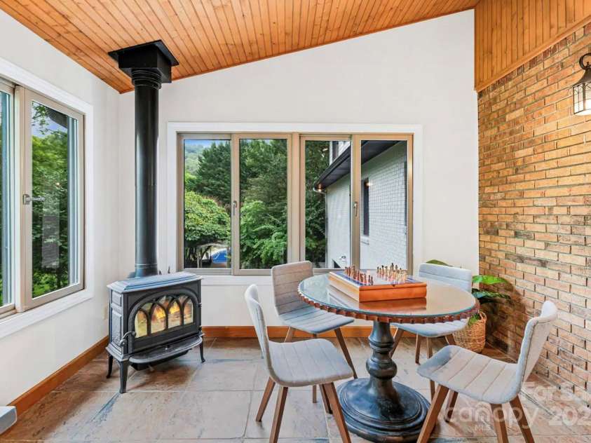 1236 Upper Brush Creek Road, Fairview, NC 28730.  MLS# CAR4233787, YatesRealty ID 13847. Four season sun room