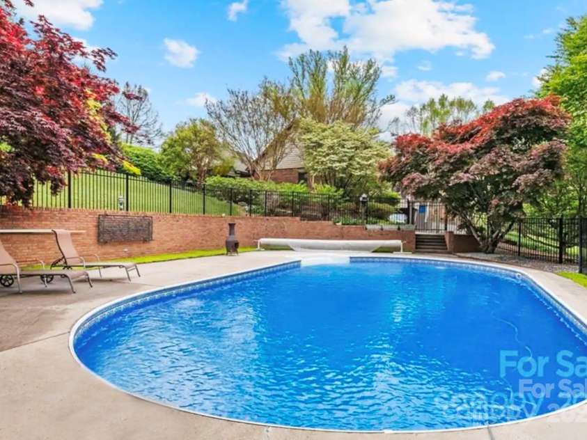 1236 Upper Brush Creek Road, Fairview, NC 28730.  MLS# CAR4233787, YatesRealty ID 13847. Fully gated pool